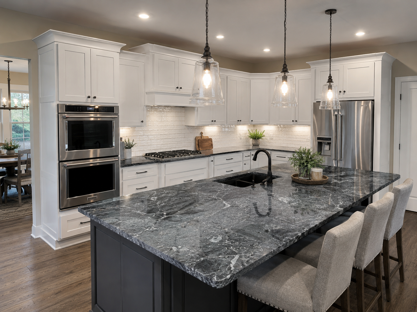 Westerville Ohio charcoal stone countertop island in a luxury white kitchen